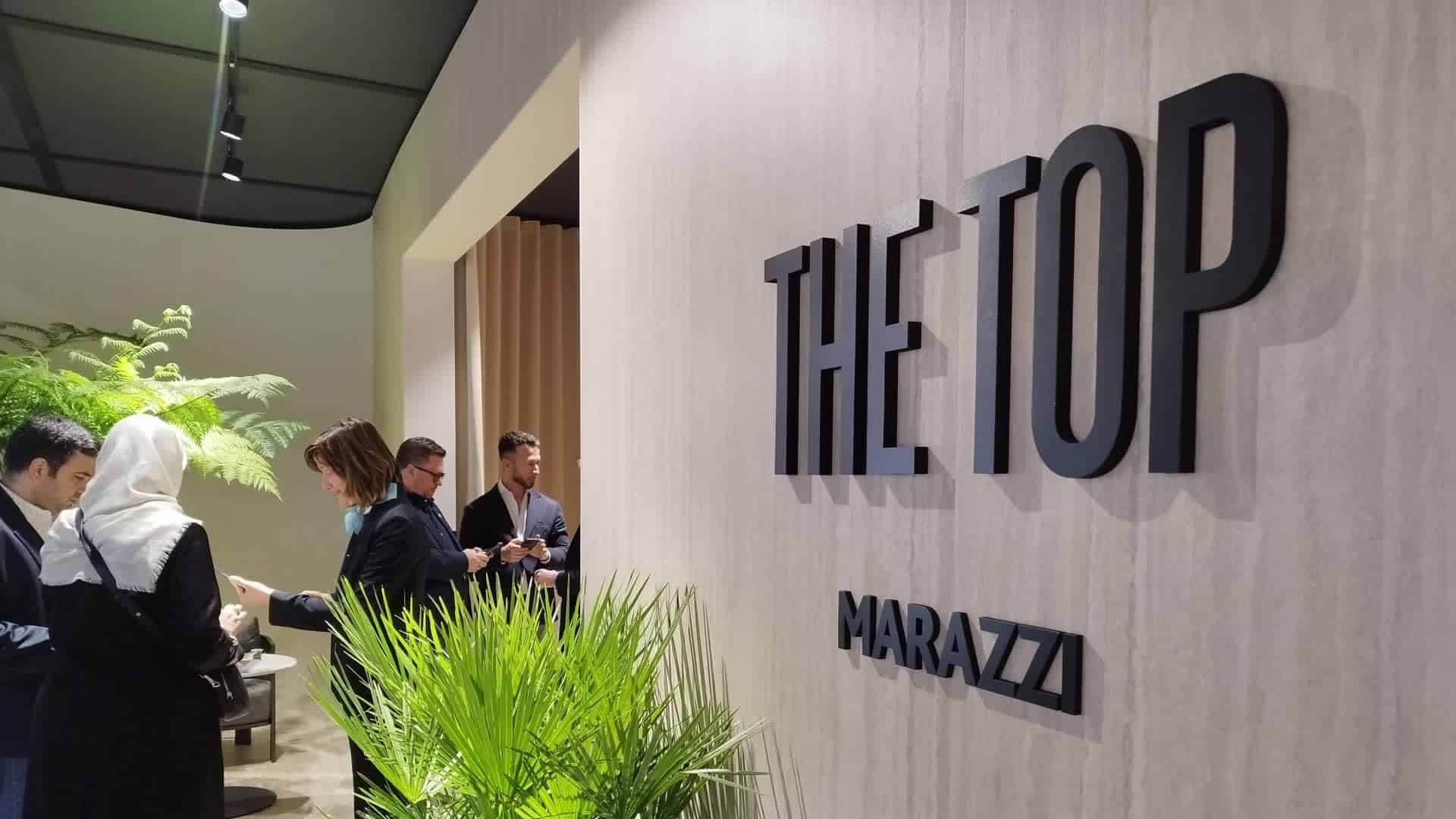 Il logo "The Top Marazzi" su uno sfondo elegante. Scopri come Modoprint può dare vita alla tua visione con qualità e creatività senza pari in ogni stampa.